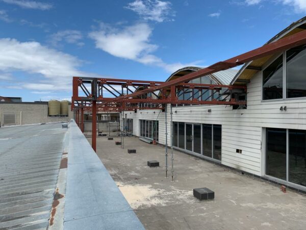 Busy with roof Structure for Middestad Mall, in Bellville, Cape Town, South Africa. Industrial & Commercial Steel Structures.